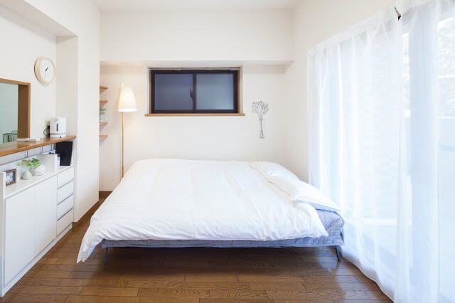 White King Bed with Wooden Floating Shelves - Guest Bedroom Ideas