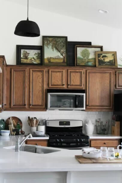 Creating an Art Gallery - above kitchen cabinet decor