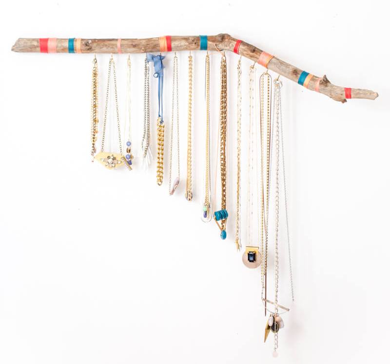 DIY hanging branch jewelry display and organizer