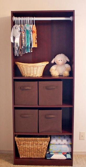 reused bookshelf for baby clothes