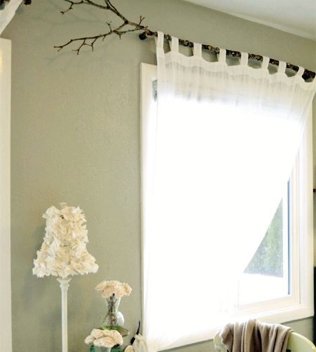 wooden tree branch for hanging curtains