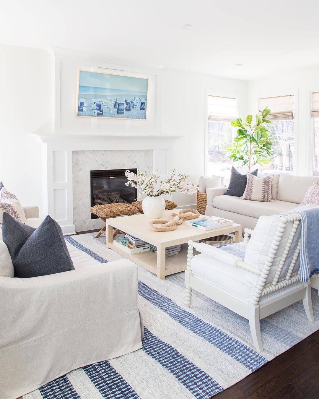 Coastal Living Room with Blue and White Striped Rug 