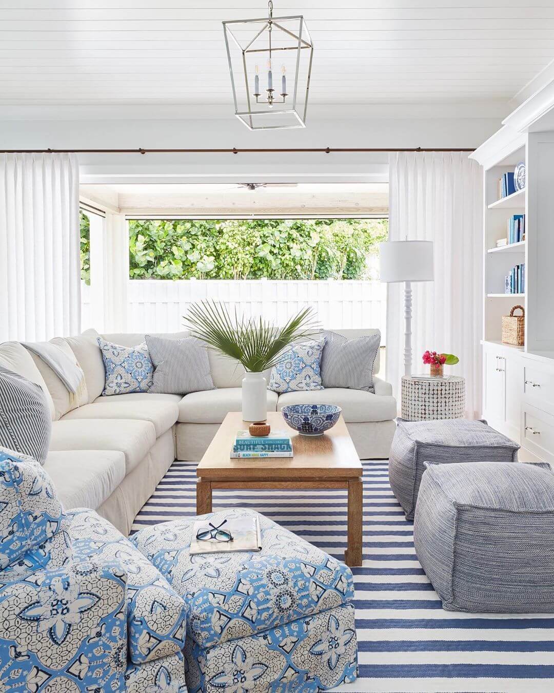 Coastal Living Room with Sectional Sofa and Stripe Rug