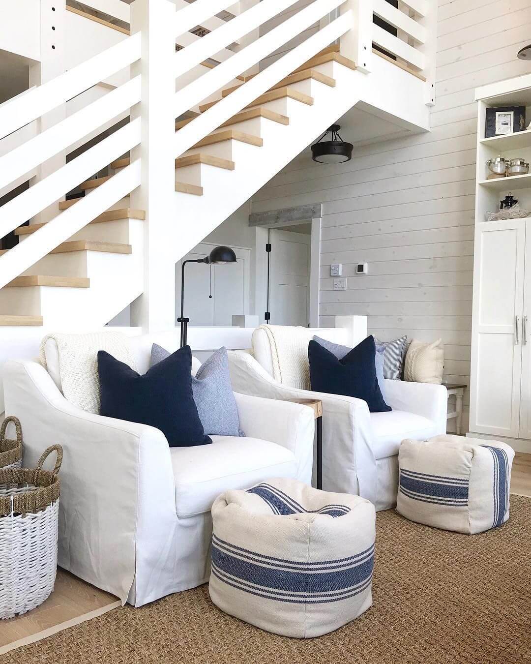 Coastal Living Room with Striped poofs