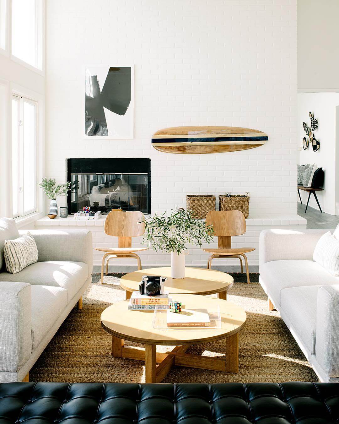 Coastal Living Room with Surfboard wall decor