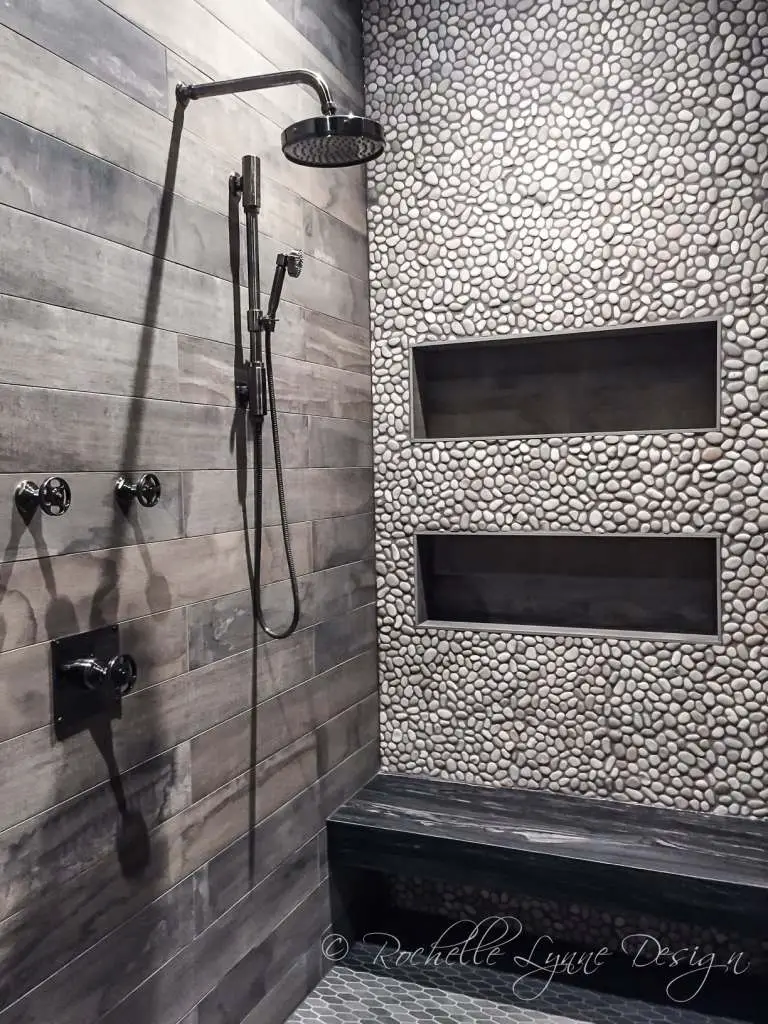 Dark Shower Tile Ideas with Inlaid Pebbles - rustic-barnboard-and-pebble-tile-shower