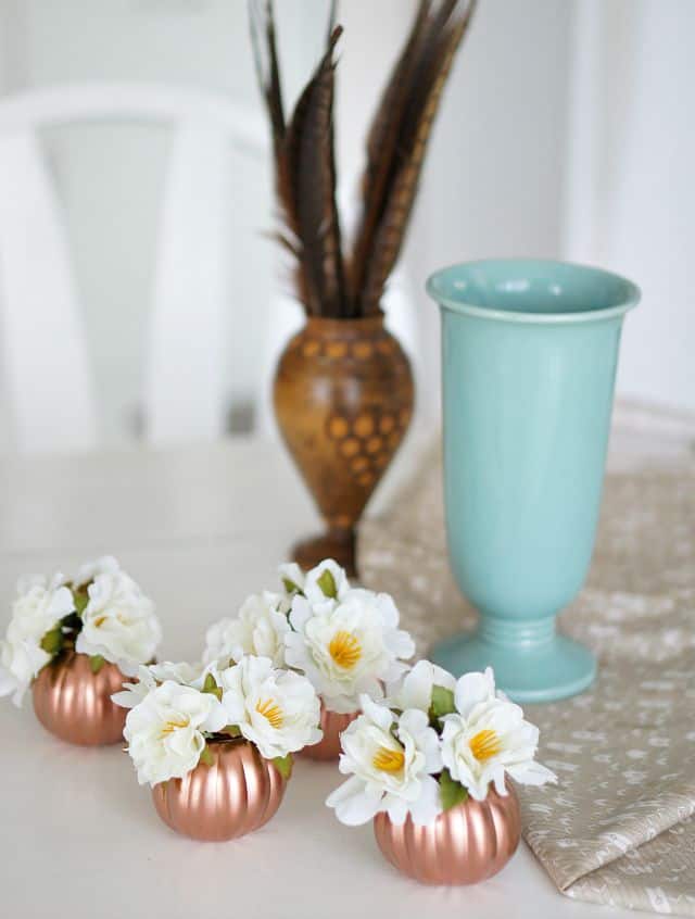 Floral pumpkins - copper-pumpkins-table