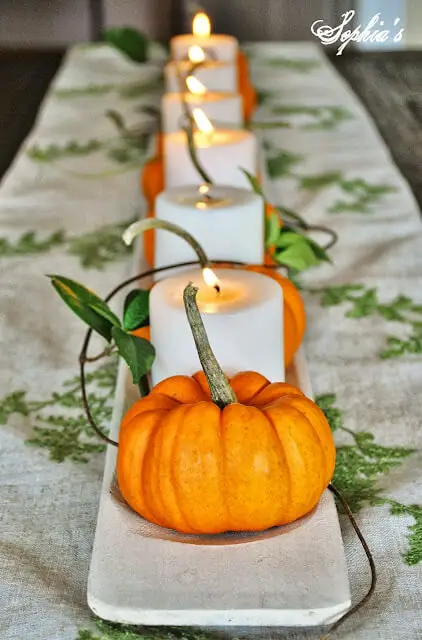 Pumpkin, candle, repeat - pumpkins and candle centerpiece