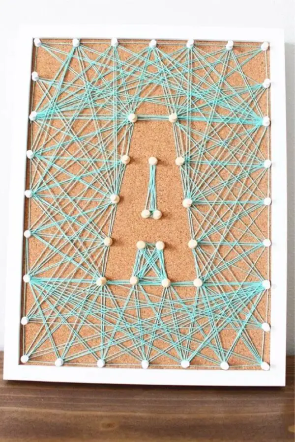 Initial String Art on A Corkboard