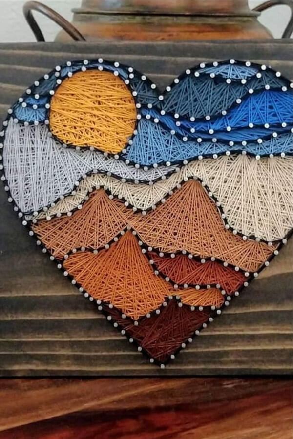 Heart Shaped String Art - mountain range nail and string craft