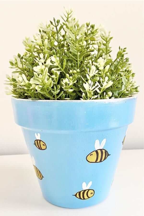 baby blue painted clay planter