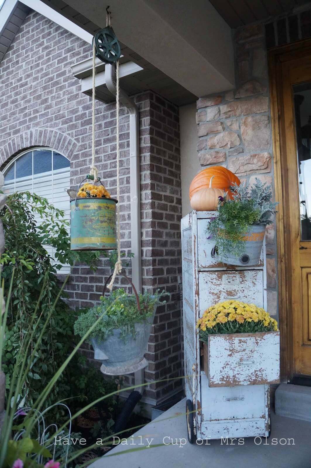 A Distressed Filing Cabinet - rustic front porch decorating ideas