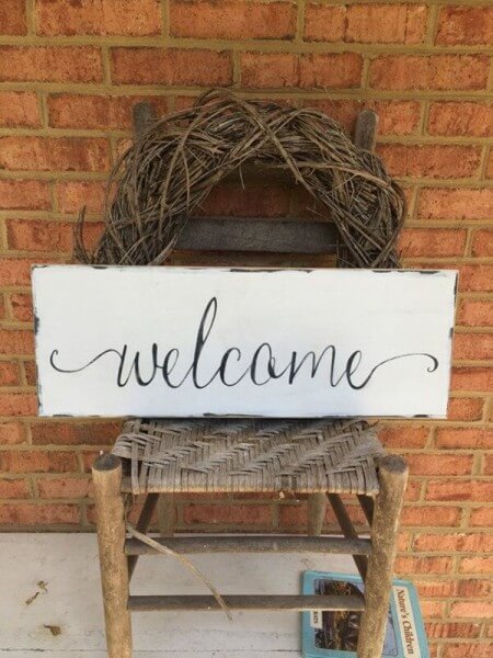 A Unique Welcome Sign - small front porch decor ideas
