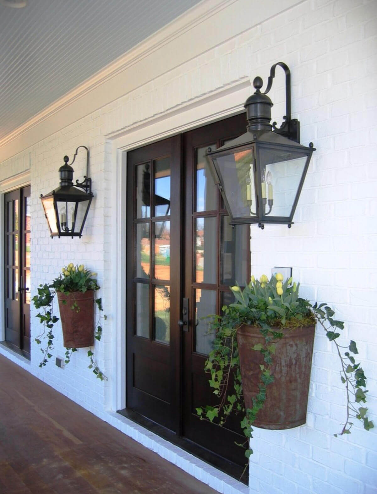 Antique Lanterns and Planters - rustic farmhouse front porch decor