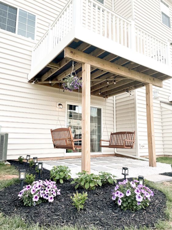 Heavenly Patio with Swings - Under deck landscaping ideas