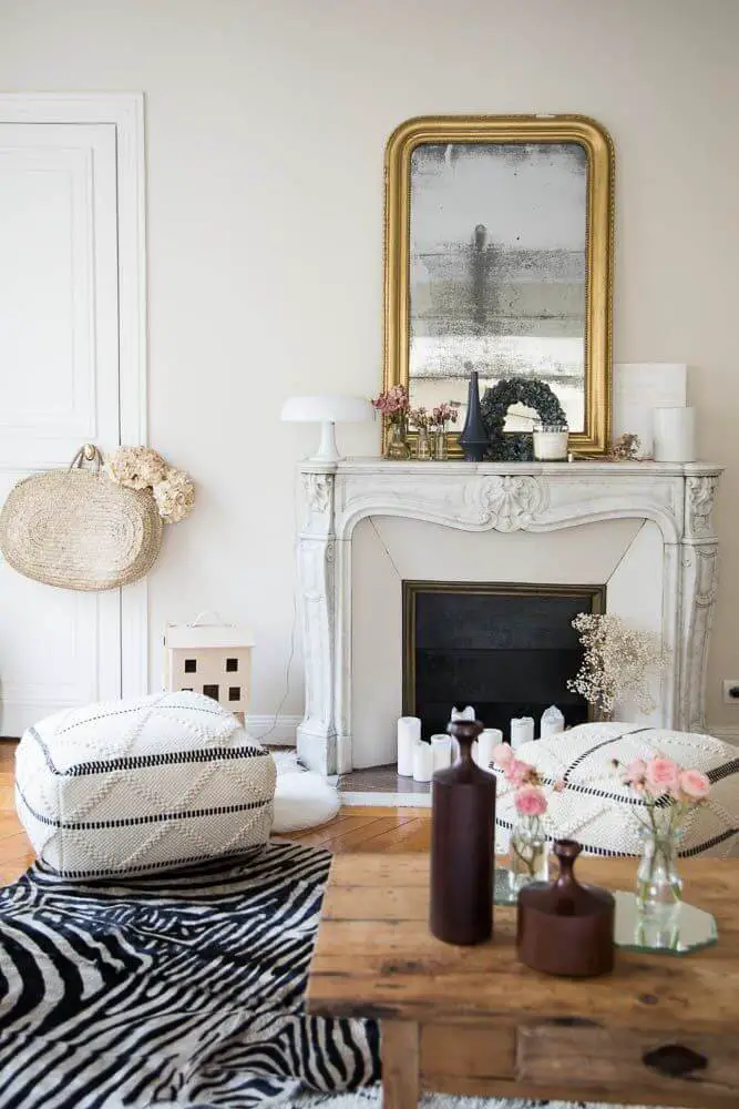 Wood coffee table and bohemian floor poofs