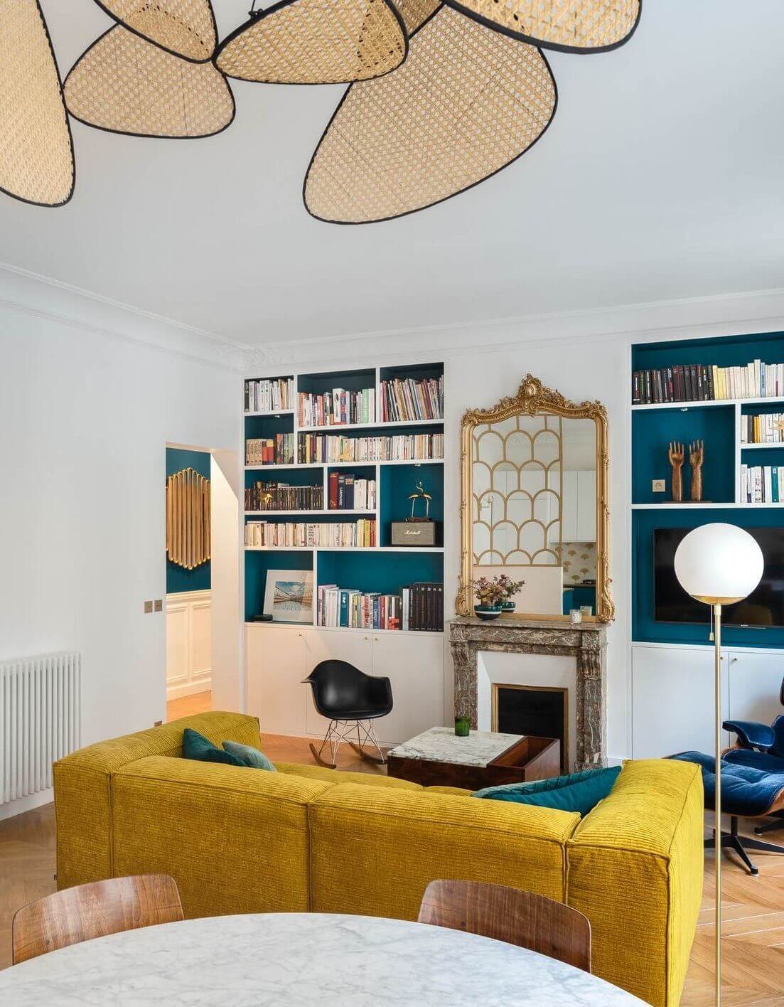 Parisian living room with mustard yellow sofa