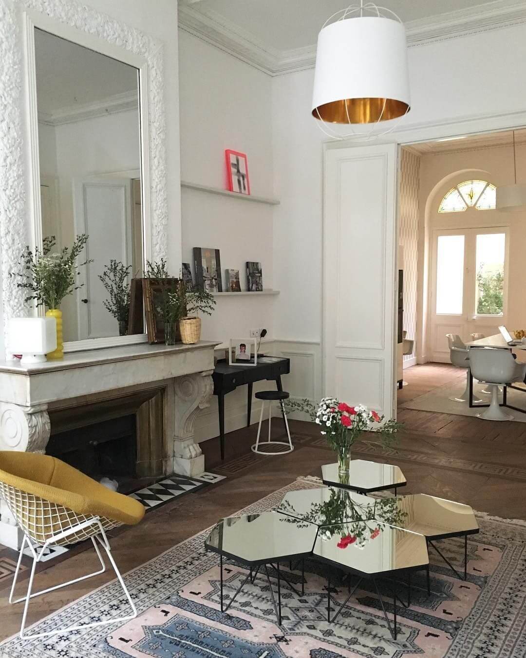 Parisian living room with mirror coffee table