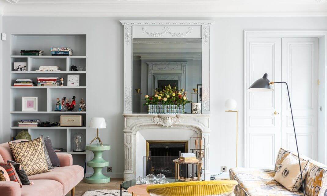 Parisian living room with blush sofa