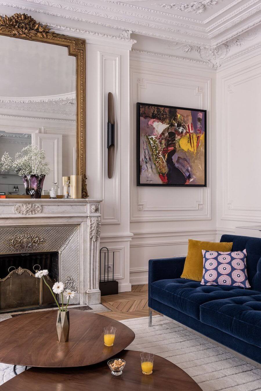 Parisian living room blue velvet sofa