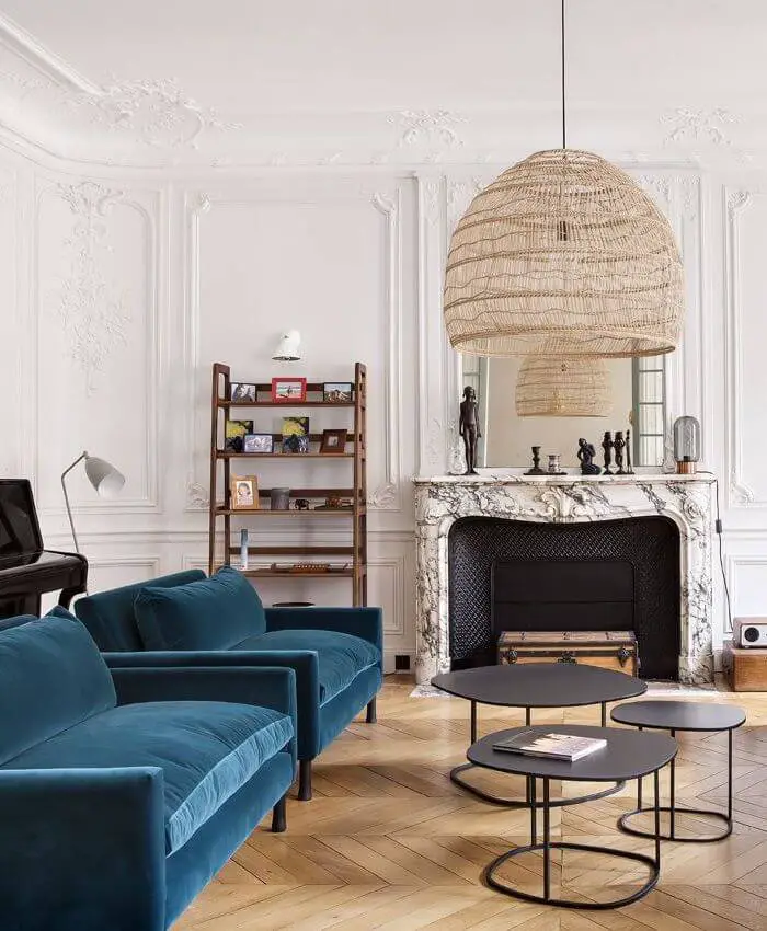 Parisian living room with turquoise accent chairs