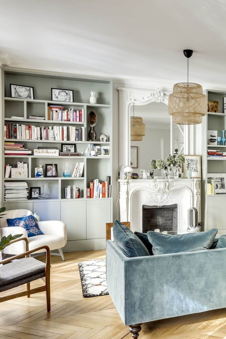 Parisian living room with faded blue sofa