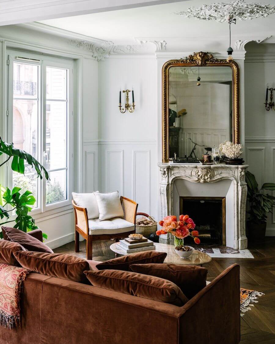 Parisian living room with Burgundy velvet sofa