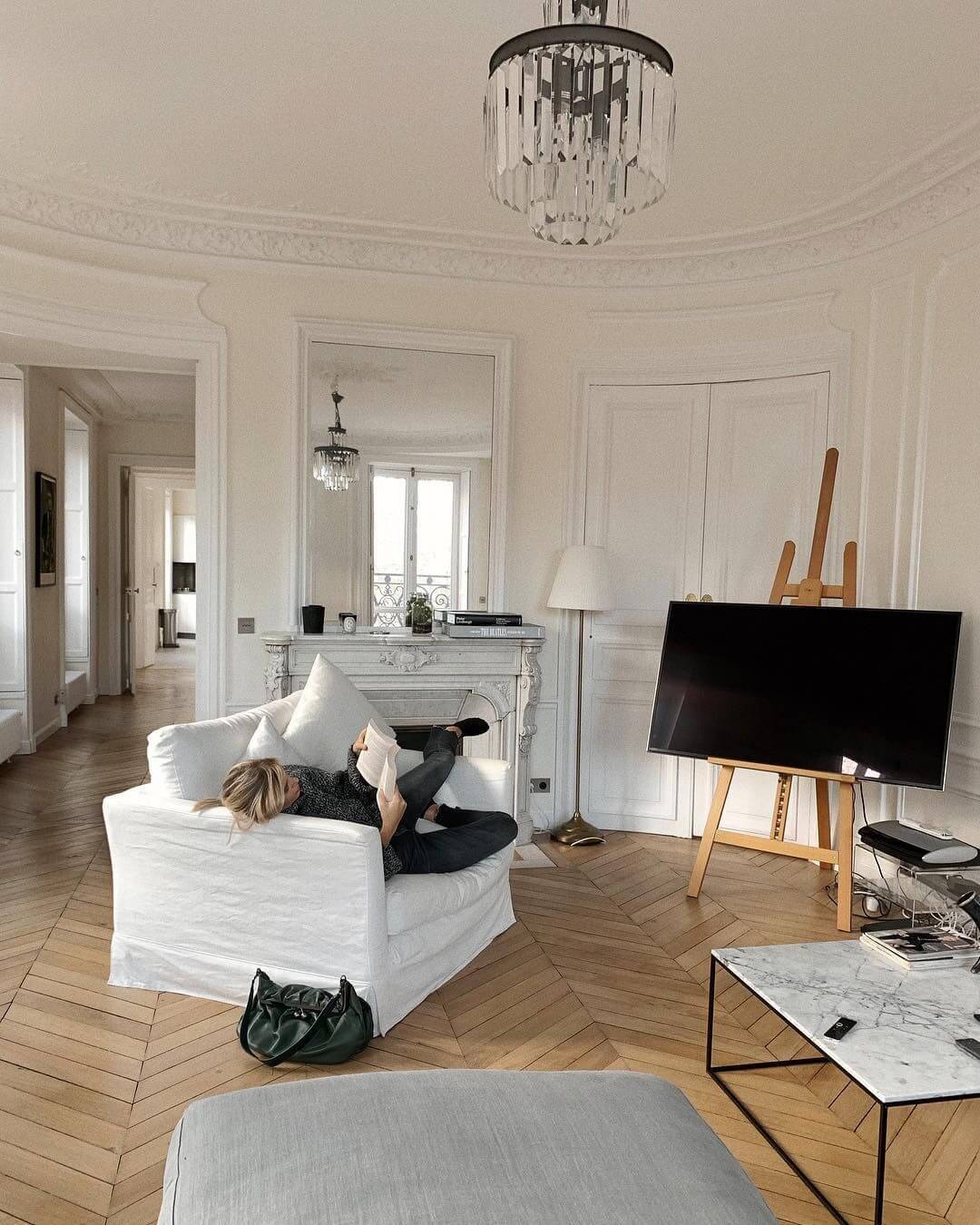 Parisian living room with TV on easel