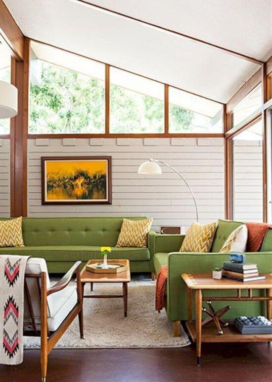 Mid Century Modern Living Room with Slanted Ceiling and Green Sofas
