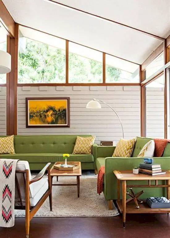 Mid Century Modern Living Room with Slanted Ceiling and Green Sofas