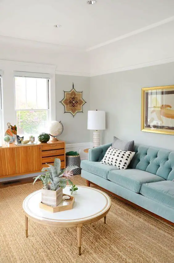 Mid Century Modern Living Room with Teal Blue Couch