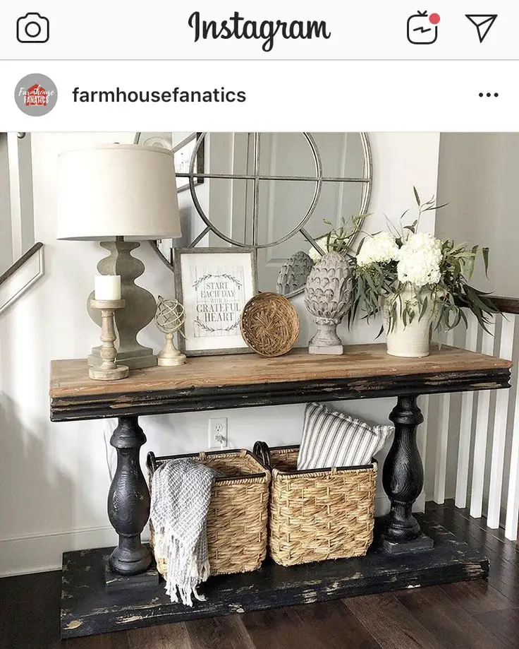 Entryway table featuring a vintage lamp for a warm and cozy ambiance