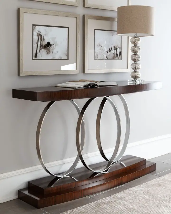 Entryway table enhanced by a captivating sculptural art piece as a focal point