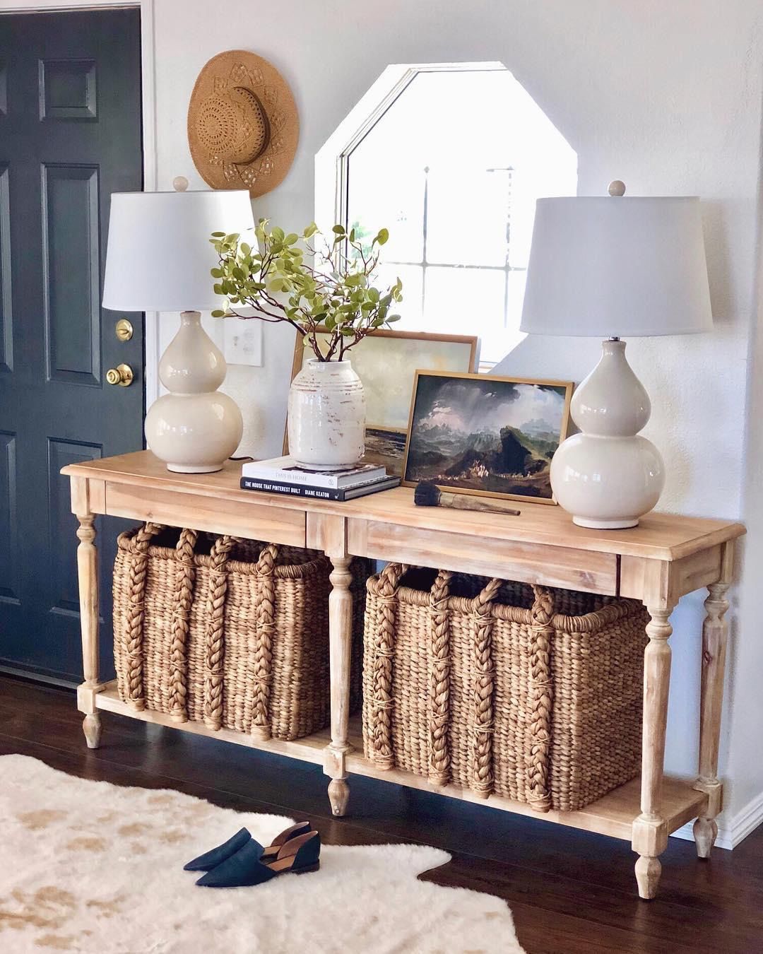 Entryway table paired with a functional basket storage unit for organization