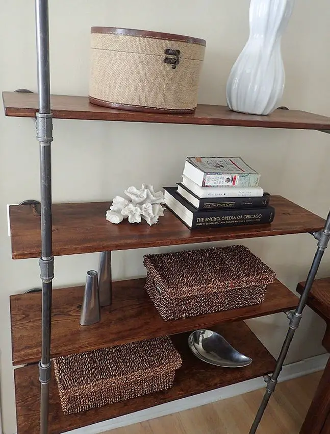 Entryway table featuring industrial pipe shelves for a trendy and functional display