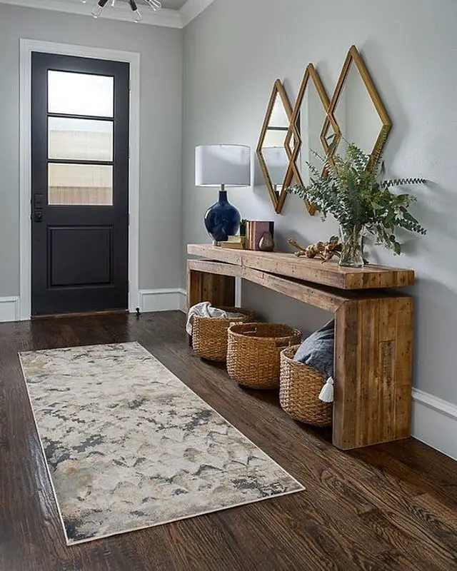 Entryway table decorated with a stylish geometric-patterned runner