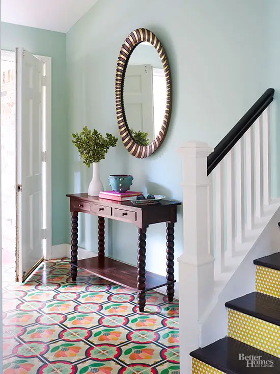Entryway table complemented by a statement mirror as a bold design element