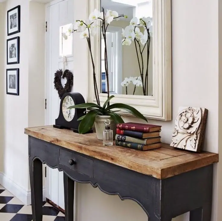 Entryway table featuring a vintage telephone as a nostalgic accent piece