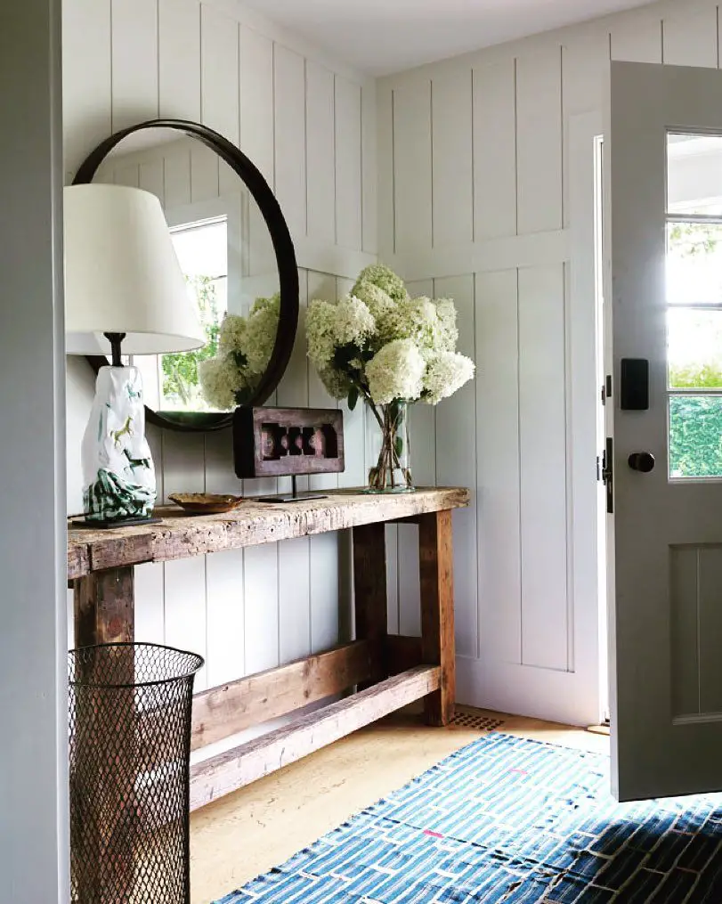 Elegant entryway table with a mirrored top for a touch of glamour