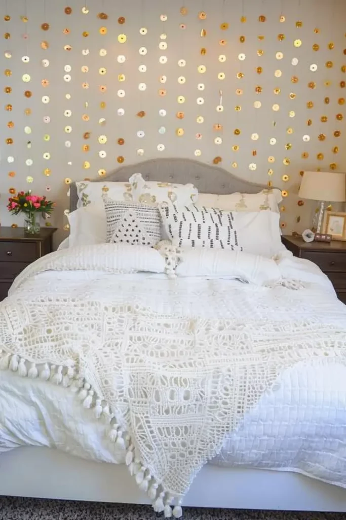 Gilded Beauty: Gold Garlands on a White Bedroom Wall