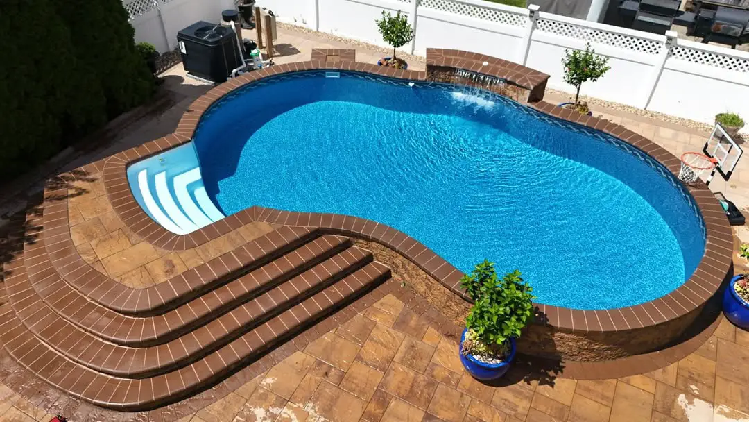 20 Stunning Semi-Inground Pool Designs for Your Backyard Oasis (You Won't Believe #8!) - 1. The Classic Kidney Shape