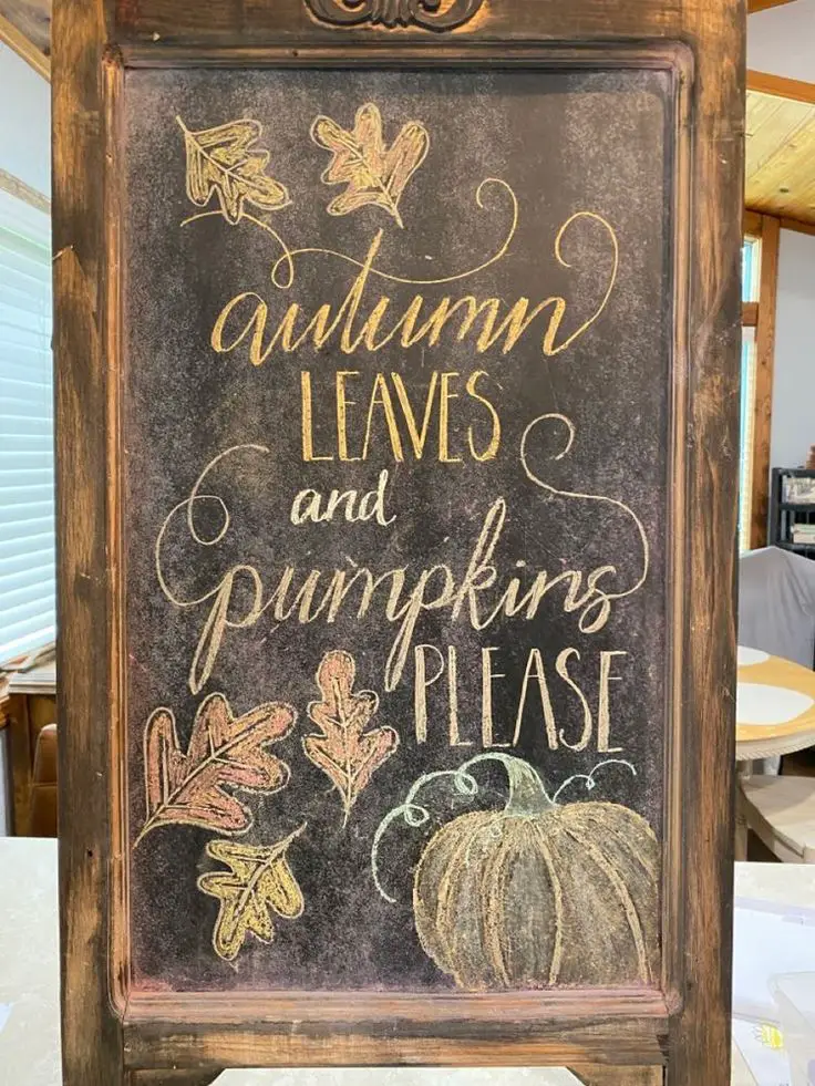 20 Creative Fall Chalkboard Art Ideas You Can DIY This Season! - 5. Autumn Leaves and Pumpkins